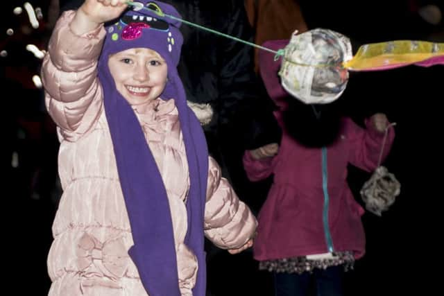 A child takes part in Whuppity Scoorie in Lanark. Picture Sarah Peters.