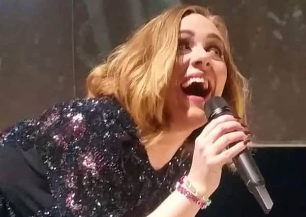 Adele receives and wears some jewellery made by Chelsea Duncan from Peterhead, Aberdeenshire. Picture: Hemedia/SWNS