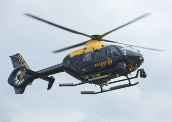 Lochrie shone a laser pen at the Police Scotland helicopter piloted by David Traill the day before he lost his life in the Clutha tragedy. Picture: Toby Williams