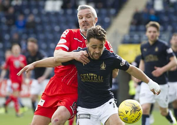 St Mirren's Jim Goodwin (left) battles for the ball against Tom Taiwo. Picture: SNS Group