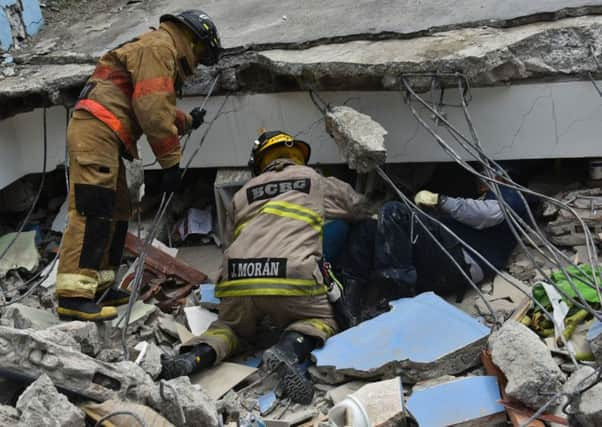 Rescuers search for survivors in the city of Gauyaquil. Picture: AFP/Getty Images