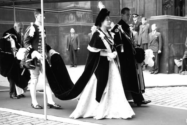 The Queen and Duke of Edinburgh walk to Signet Library on Parliament Square