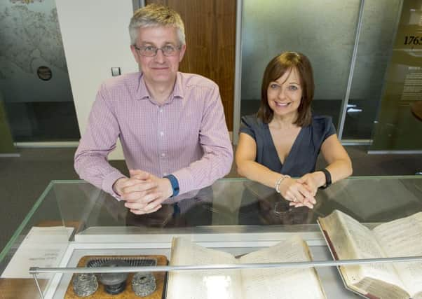 Leading the drive to take the land registry online are Charles Keegan, left, and Karen Alexander, pictured at Registers of Scotland, Meadowbank House, Edinburgh. Picture: Ian rutherford