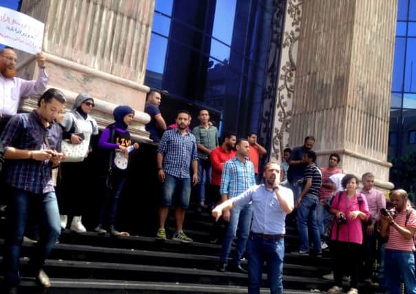 Journalists chant slogans during a protest in front of the Journalists' Syndicate in Cairo. Picture: AP