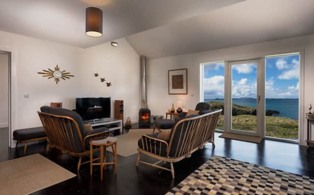 A lounge with a view of the Sound of Harris