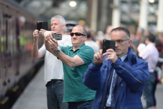 Trainspotters capture the Flying Scotsman. Picture: Neil Hanna