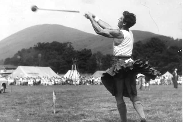 Jay Scott winning the confined 16lb hammer at the Luss Highland Games.