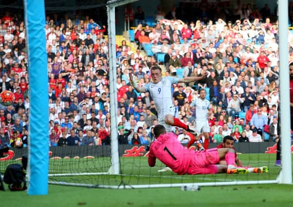 Jamie Vardy forces the ball past goalkeeper Volkan Babacan to score Englands late winner. Picture: Getty