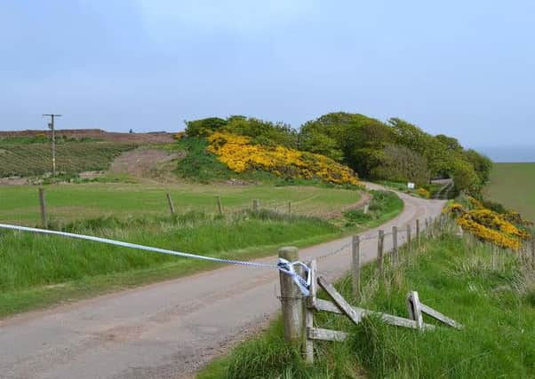 The road entrance to the investigation scene at Kinneff. PIC Alison Campsie