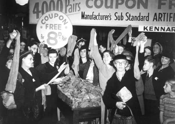 Some of the women who rushed to a Croydon store to take advantage of a coupon-free sub-standard stockings offer.   Picture: Keystone/Getty Images