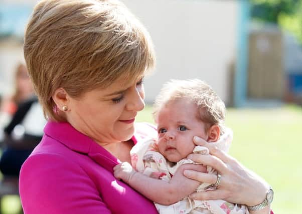 Nicola Sturgeon holds six-week0old Nicola MacDonald from Saltcoats. Picture: Robert Perry