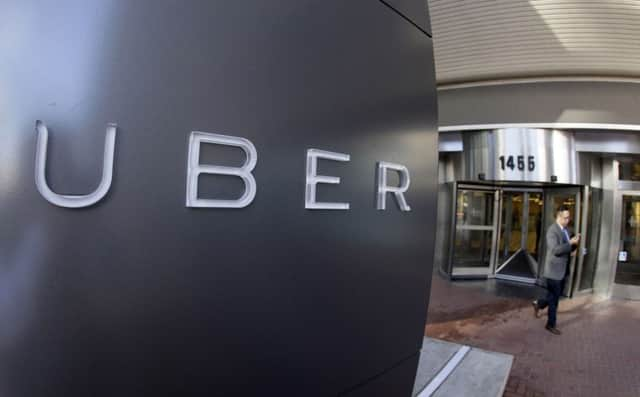 Uber: Warlmart tie-up. Picture: AP