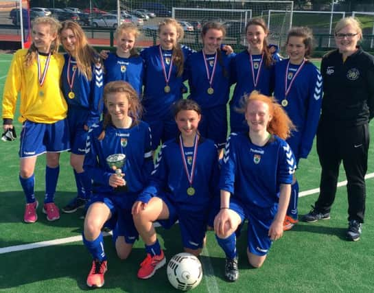 High School of Glasgow Under 15s girls seven-a-side title winning squad: back from left, Emily Taylor, Sarah Turnbull, Emily Sillars, Helena Gronski, Mhairi Crooks, Christina Miller, Jennifer Cuthill, girls football coach and chemistry teacher, Mhari Peek; front from left, Lucy Williamson, Yesmi Edgar, Georgia Cross.