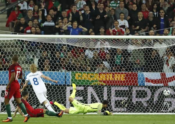 Midfielder Birkir Bjarnason pounces to equalise for Iceland