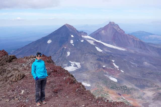 Sophie Nicholson with a view of Broken Top mountain