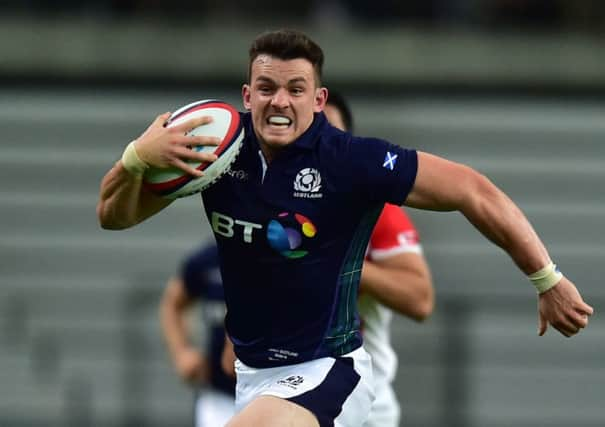 Scotland's Matt Scott sprints away during the match against Japan. Picture: Getty