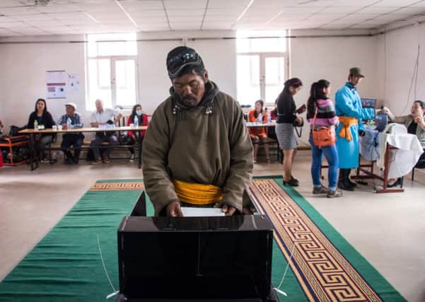 Herder Pagvajaviin Shatarbaatar casts his vote in Mandalgovi in the Gobi desert. Picture: Getty