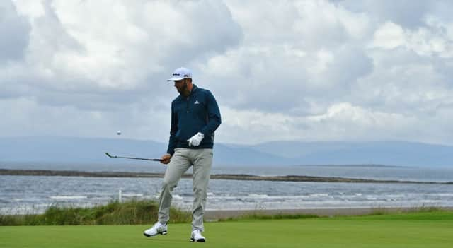 Dustin Johnson taps a ball in the air with his club during practice ahead of the Open at Royal Troon. Picture: Stuart Franklin/Getty Images