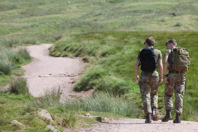 Soldiers from The Rifles regiment training in the Brecon Beacons the day after Corporal Hoole's death. Picture: SWNS