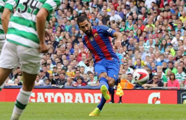 Barcelonas Arda Turan scores the opening goal at the Aviva Stadium in Dublin last night. Picture: Paul Faith/Getty Images