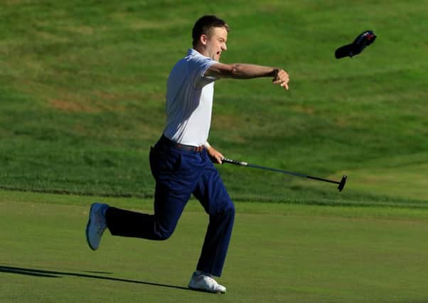 Russell Knox of Scotland reacts on the 18th green after winning the Travelers Championship in Cromwell, Connecticut. Picture: Michael Cohen/Getty