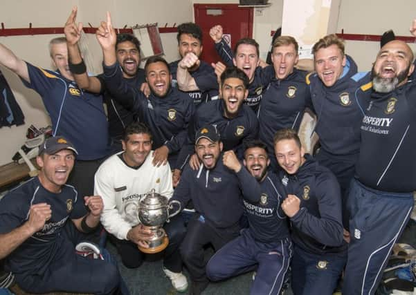 The victorious Clydesdale players celebrate in the dressing room after defeating Arbroath to lift the Scottish Cup at Hamilton Crescent. Picture: Donald MacLeod