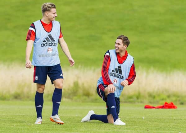 Hibs' Jason Cummings and Hearts' Sam Nicholson will line up together this week for Scotland Under-21s. Picture: Roddy Scott/SNS