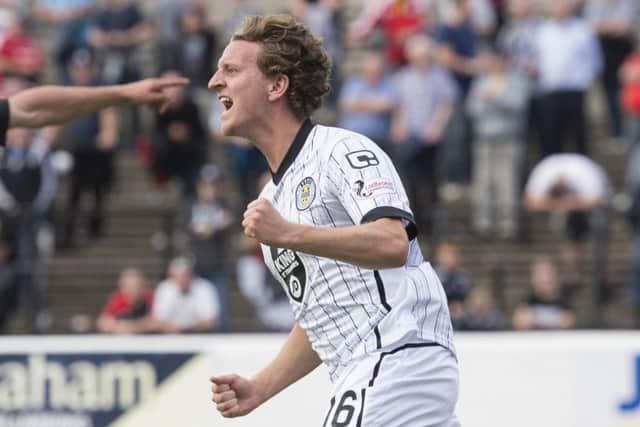 St Mirren's Tom Walsh celebrates scoring the equaliser.