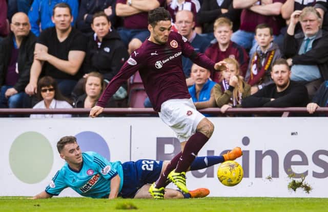 Hearts striker Tony Watt evades the challenge of Hamiltons Darren Lyon during the Edinburgh sides 3-1 victory at Tynecastle on Saturday. Picture: SNS