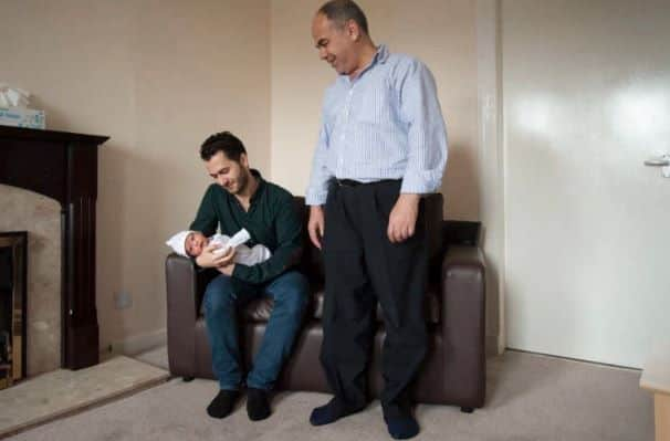 Omar with his father Abdulrazaq and his grandfather, Zuhair. The family say they would like to settle in Scotland (Photo: Martin Hunter)