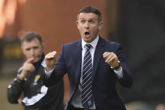 Ross County manager Jim McIntyre disagreed with one of his player's comments that the Staggies can finish above Rangers this season. Picture: SNS