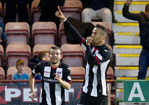 Farid El Alagui celebrates his 85th-minute winner.  Picture: Garry Williamson/SNS