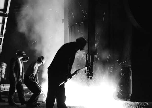 Workers at Colvilles Strip Mill in Ravenscraig. The plant employed 12,000 workers at its peak but closed in 1991- three years after British Steel was privatised. PIC TSPL.