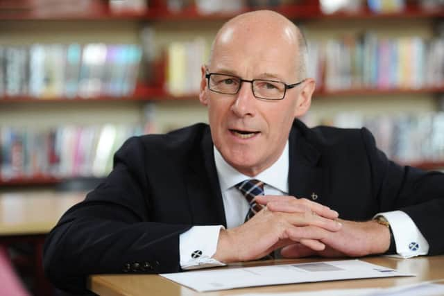 John Swinney assured headteachers they would not become bureaucrats under new plans to hand them more powers. Picture: John Devlin