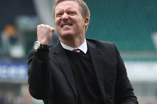 Gary Locke celebrates his Hearts side's derby victory over Hibs at Easter Road in April 2014. Picture: SNS Group