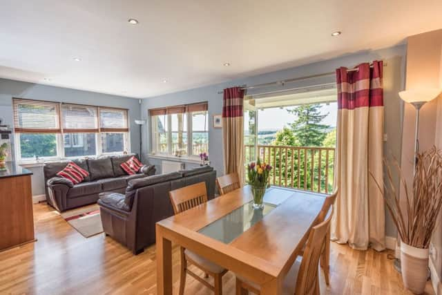 The open plan dining room with balcony