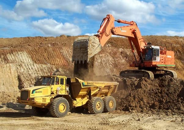 Mining giant BHP Billiton has set itself a target for women to account for half its workforce by 2025, up from the current level of 17%. Picture: STR/AFP/Getty Images