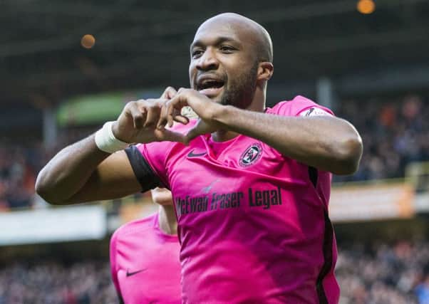 William Edjenguele celebrates his goal. Picture: SNS