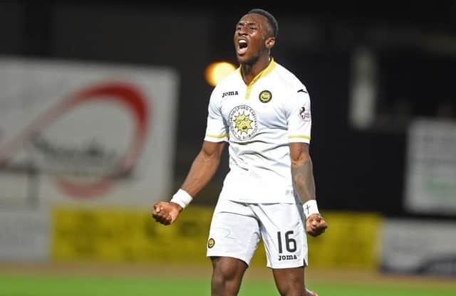 Patrick Thistle's Ade Azeez celebrates his opener. Picture: SNS