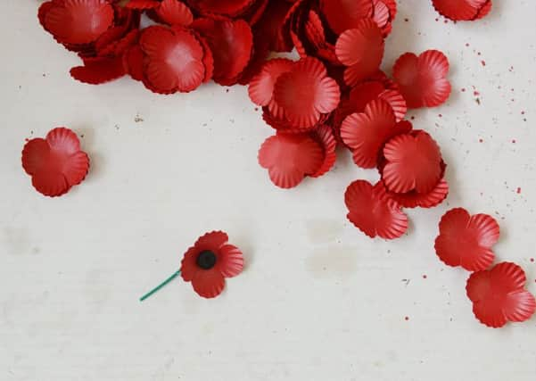 Poppies are assembled at the Lady Haigs Poppy Factory in Queensferry. Photograph: Neil Hanna