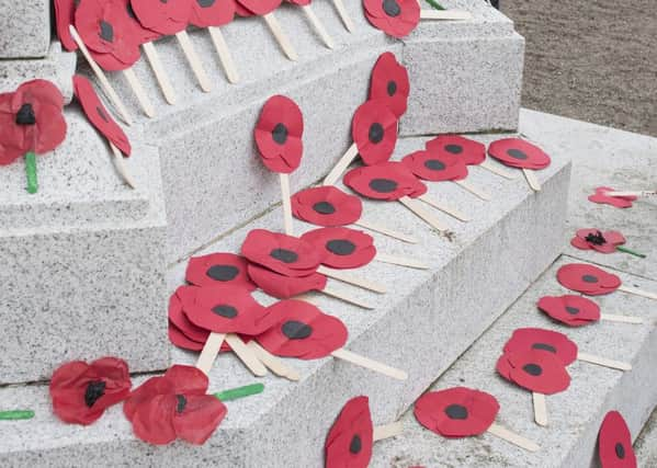 England and Scotland players wore poppies on black armbands during the match