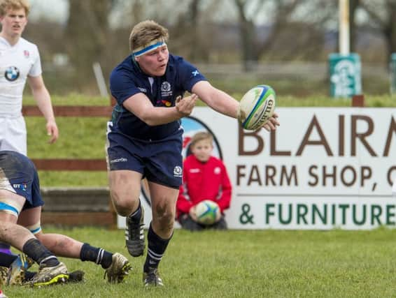 Dollar Academy's
 Euan McLaren in action for Scotland U18