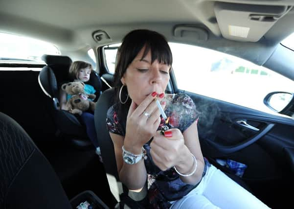 A new law has banned smoking in cars with children. Picture: John Devlin.