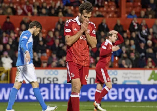 Andrew Considine had Aberdeens best chance of the match but sent a free header over the bar. Picture: SNS.