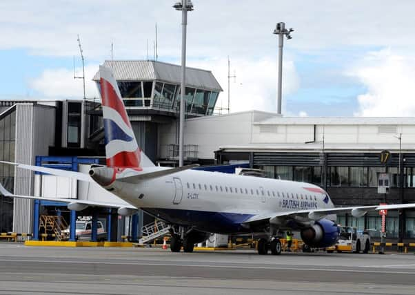 A strike by baggage handlers over the festive season could cause chaos at UK airports. Picture: Lisa Ferguson