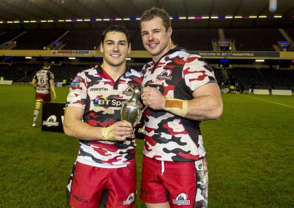 Sam Hidalgo-Clyne, left, and Allan Dell celebrate Edinburgh's 1872 Cup success last season. Picture: Paul Devlin/SNS/SRU