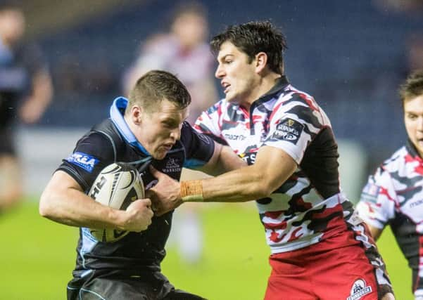 Mark Bennett in action for Glasgow, taking on Edinburghs Sam Hidalgo-Clyne in the 1872 Cup. Picture: Ian Georgeson