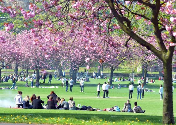 Edinburgh residents relax in the Meadows. Monday is expected to bring temperatures in the mid teens for much of Scotland. Picture: Jon Savage.