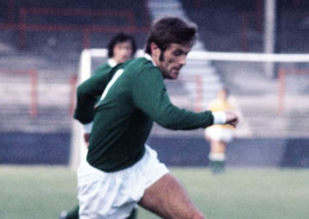 Pat Stanton in action for Hibernian.