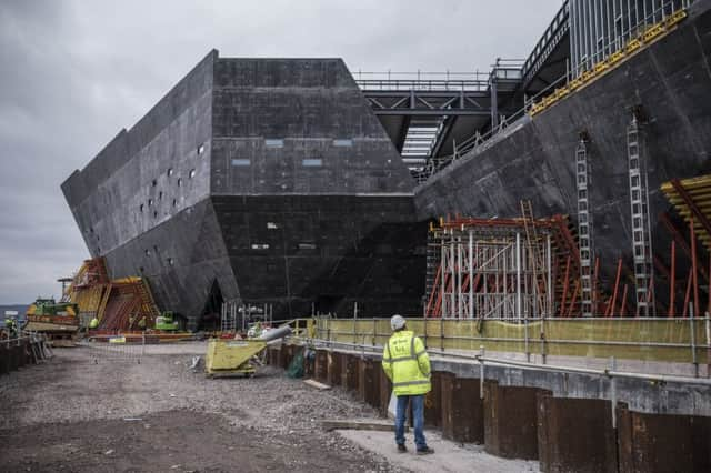 The wraps have come off Dundee's new V&A Museum of Design as most of the scaffolding has been removed from the outside of the building and you can see its shape for the first time.